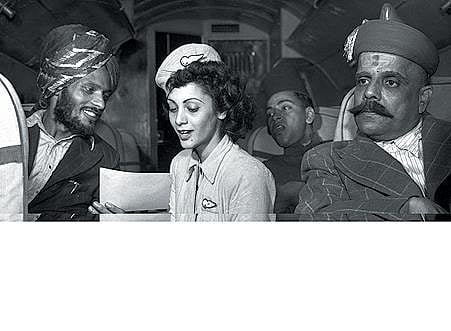 Air hostess Monica Gilbert shares the flight report with a Sikh passenger