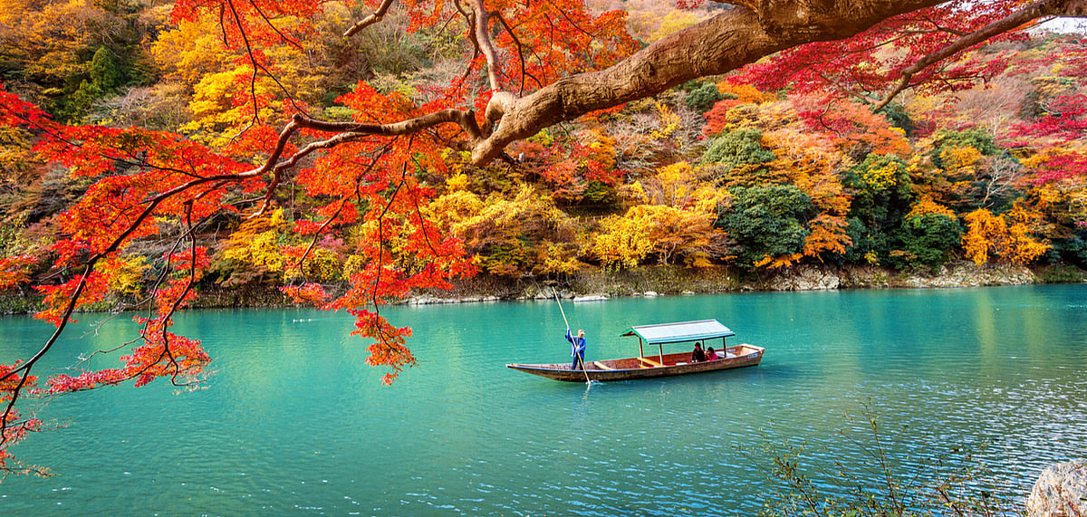 Arashiyama in autumn season along the river in Kyoto