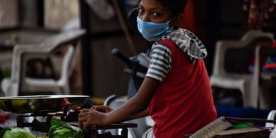 A child sells vegetables in Bharuch, Gujarat