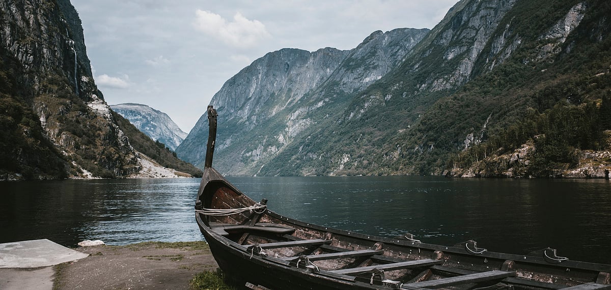 Old Viking boat replica in a Norwegian landscape near Flam, Norway.