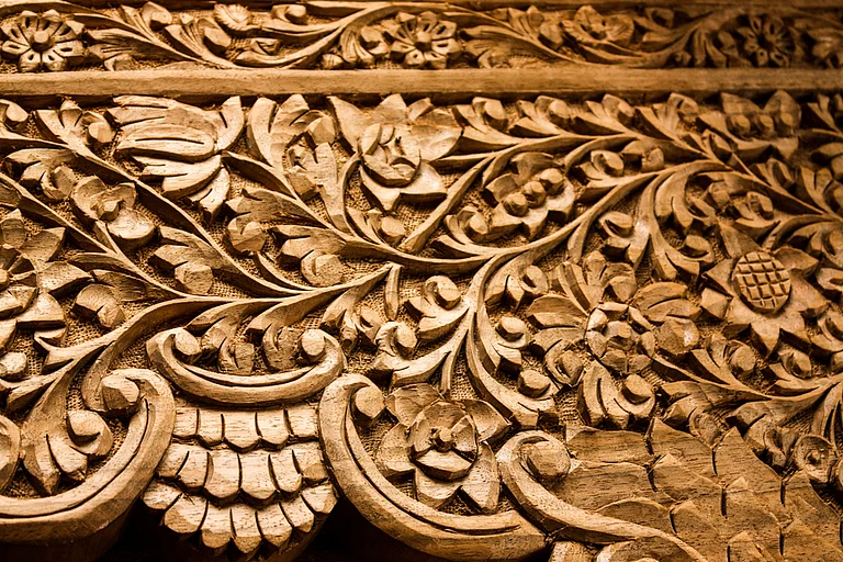 Kashmiri Walnut Bed Board Detail with Floral Design. Hand-carved by a Master Craftsman in a small village of Kashmir. - null