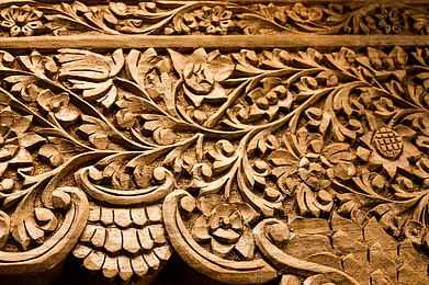 Kashmiri Walnut Bed Board Detail with Floral Design. Hand-carved by a Master Craftsman in a small village of Kashmir.