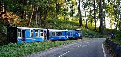The powder blue coaches pulled by the wee locomotive are a huge tourist attraction