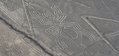 A spider figure etched in the sands of Peru, an example of the Nazca Lines
