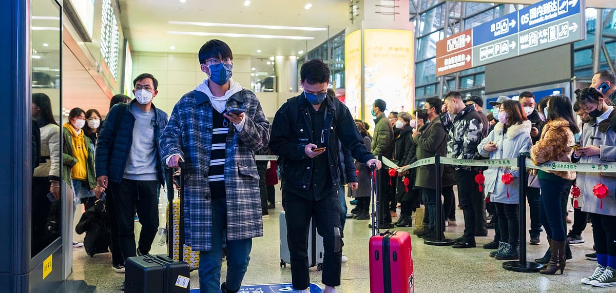 Representative Image Travellers use masks and head to the airport as the restrictions get lifted