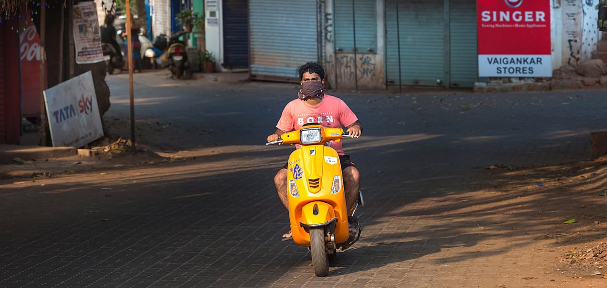 A tourist drives through the lanes of Arambol 