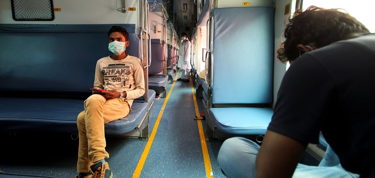 Its mandatory to use masks on trains maskless people will be fined Rs 500.