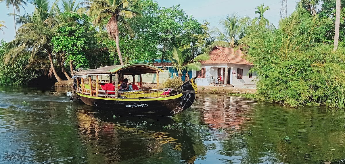 Tourists and locals use ferries to navigate Keralas backwaters