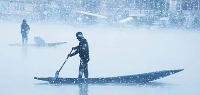 File photo of snowfall over Dal Lake