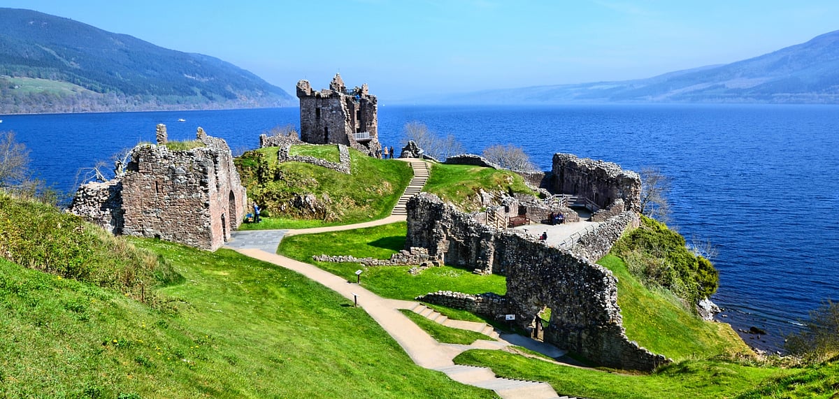 Ruins of Urquhart Castle along Loch Ness, Scotland - Shutterstock