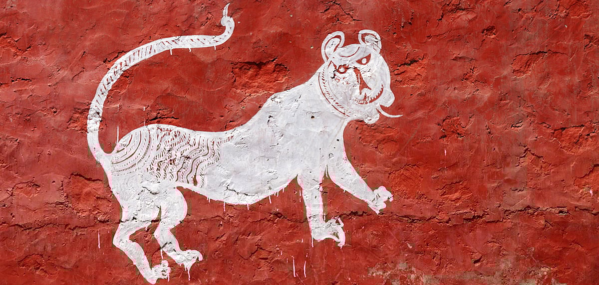Mural of a tiger on a village wall in Sawai Madhopur