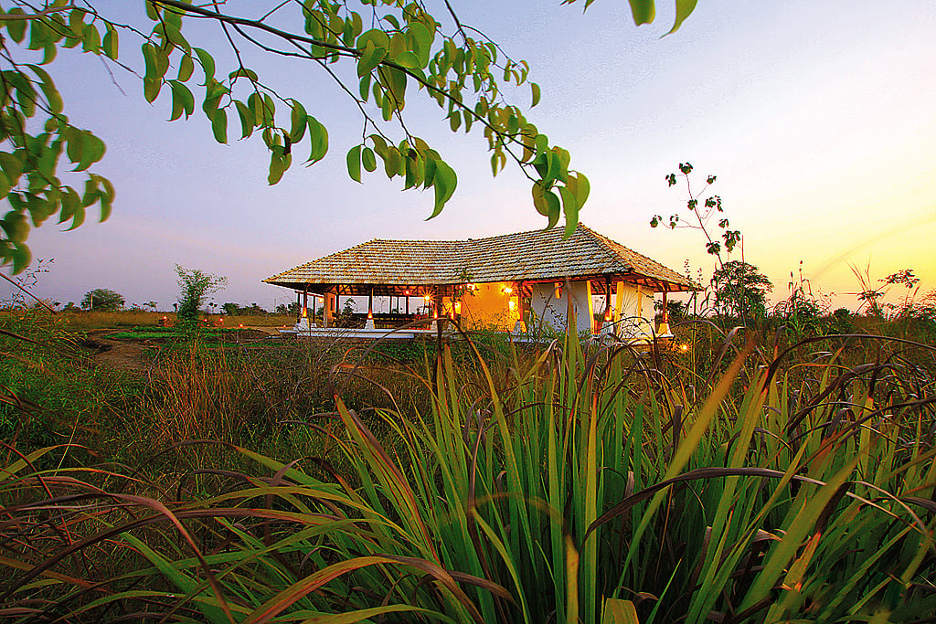 The Teak Pavillion serves as an outdoor bonfire and dinner space