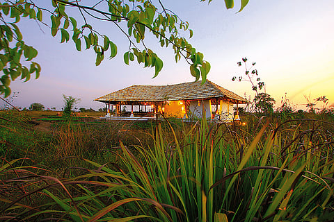 The Teak Pavillion serves as an outdoor bonfire and dinner space