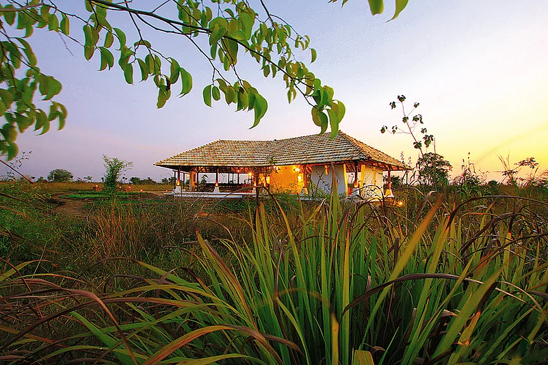 The Teak Pavillion serves as an outdoor bonfire and dinner space