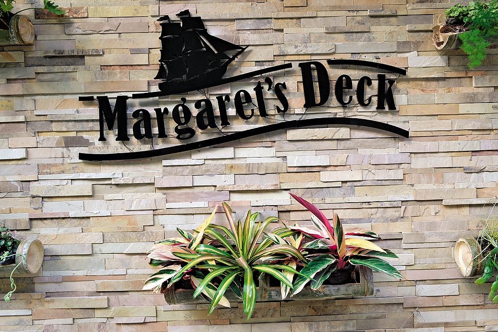 Goodricke Teapot, Margarets Deck welcomes you with its elegant logo, plants and decoration