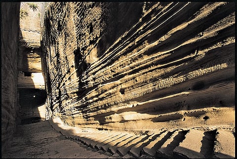 At the foot of Girnar Hill is the rock on which Ashokas 14 edicts in Brahmi script are carved