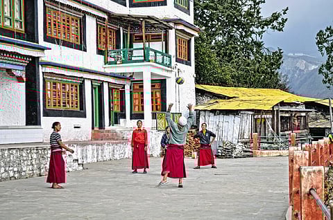 Monks play volley ball at Tawang Monastery.