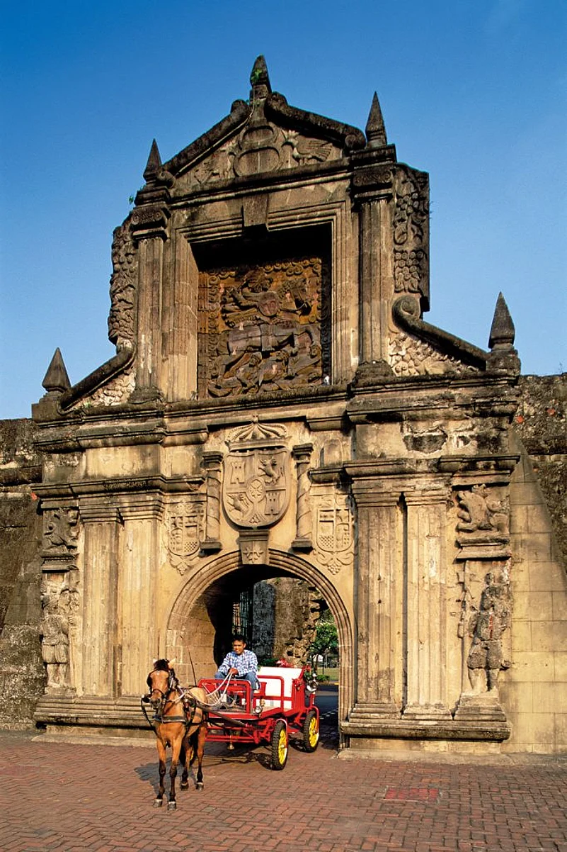 A horse carriage stands at the entrance of Fort Santiago in the Intramuros Historical District