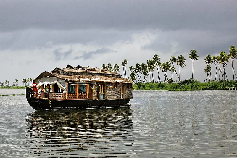 On the canals, boatmen row past with grace even as traffic hurtles above their heads on modern bridges