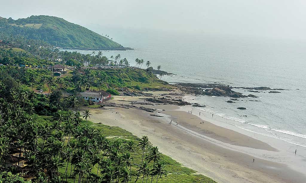 The coconut palm-lined Vagator Beach, as seen from Chapora Fort.