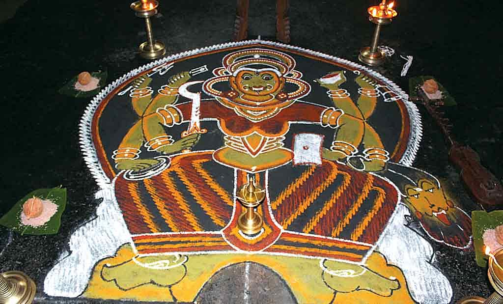 An elaborate pookalam representing a Kathakali dance