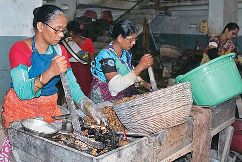 Women working at cashew factory