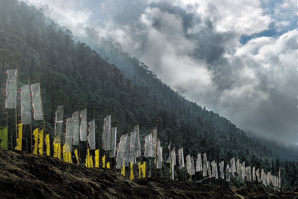 Towering white flags are erected in sets of 108 when a loved one dies