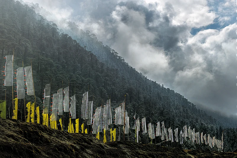 Towering white flags are erected in sets of 108 when a loved one dies