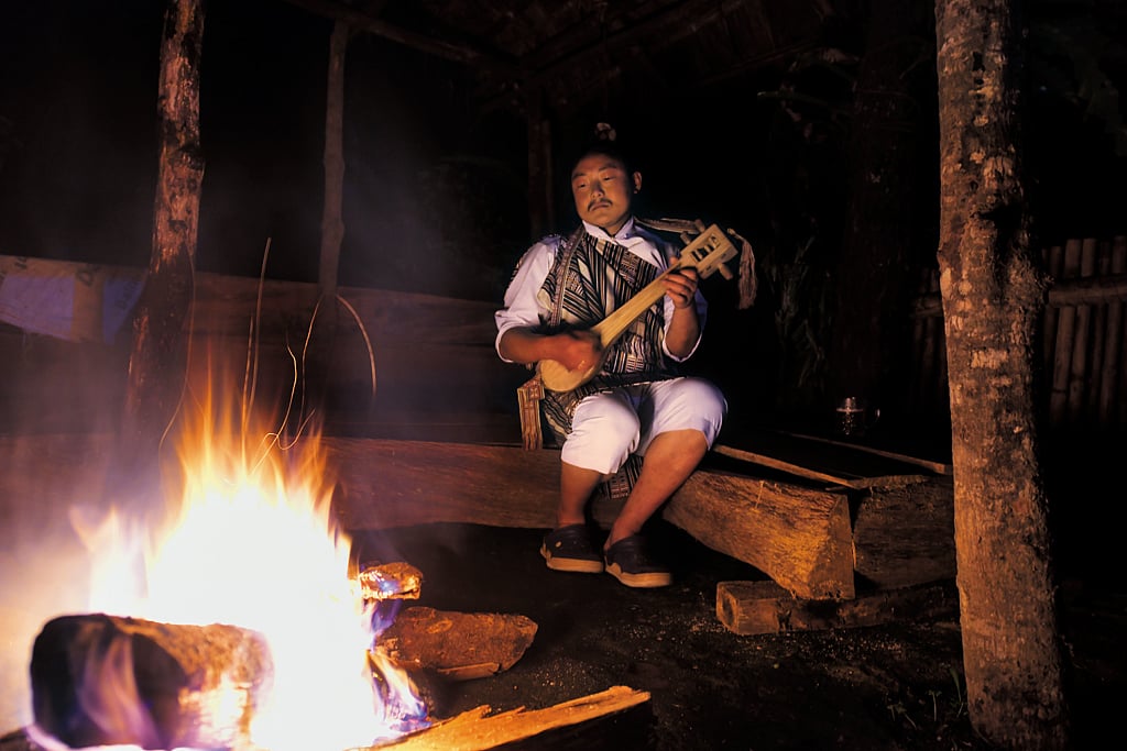 Nim Tshering plays the thungbuk by a bonfire