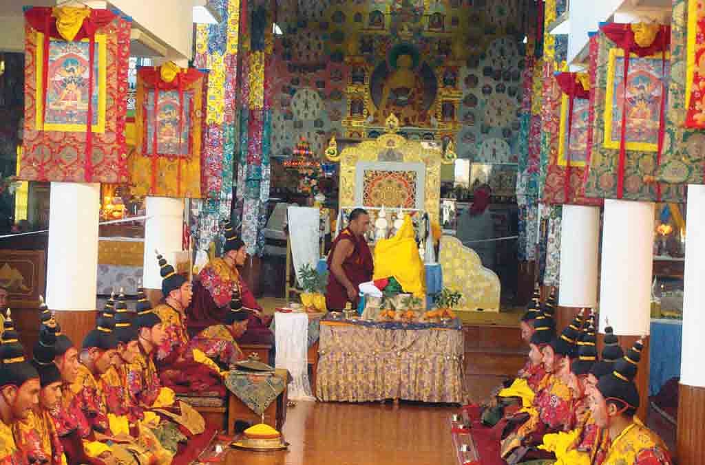 Monks go about their daily rituals at a monastery