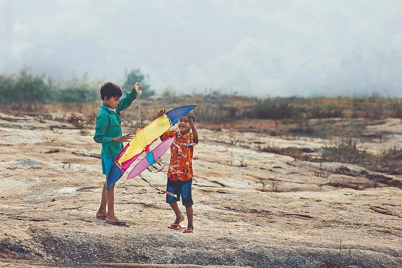 The kites have a unique shape, comparable to a glider or a butterfly