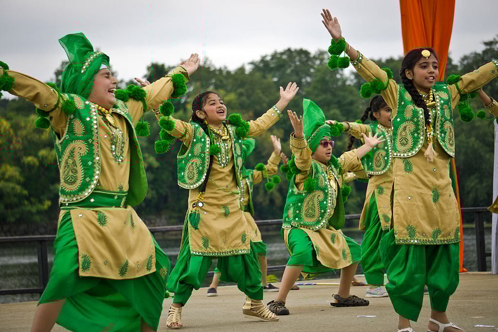 People celebrate with community fires and dancing