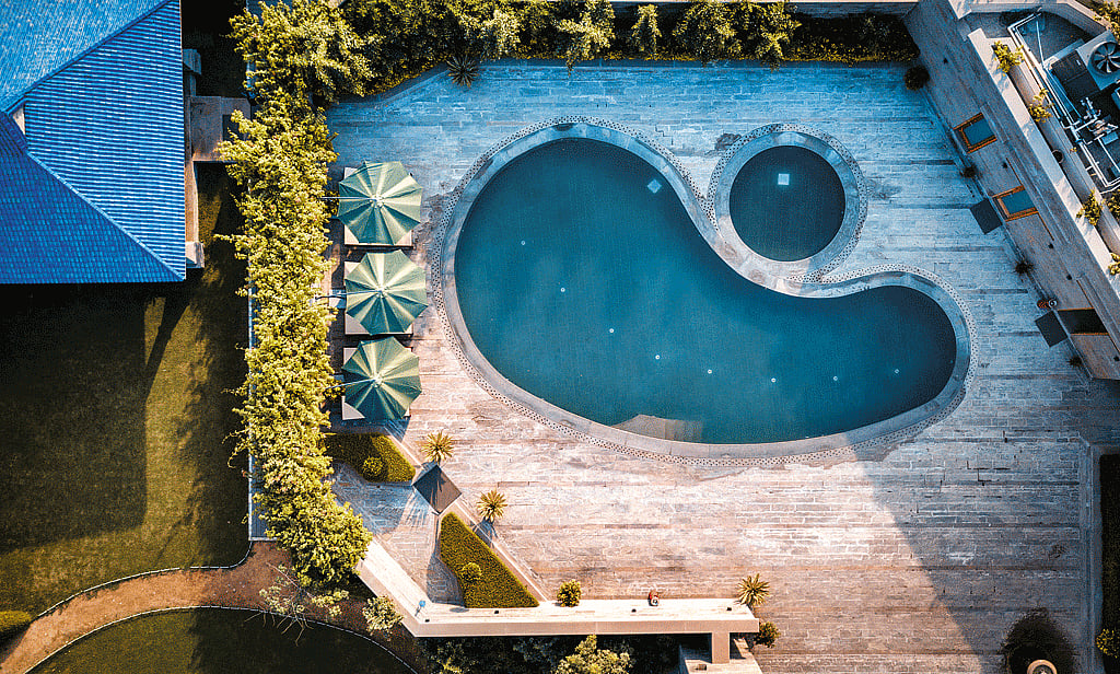 The swimming pool at Naad Wellness