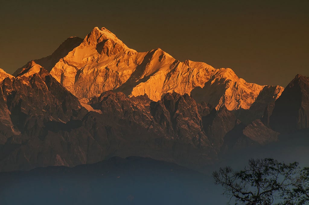 Get a close-up view of Mount Kanchendzonga from a helicopter