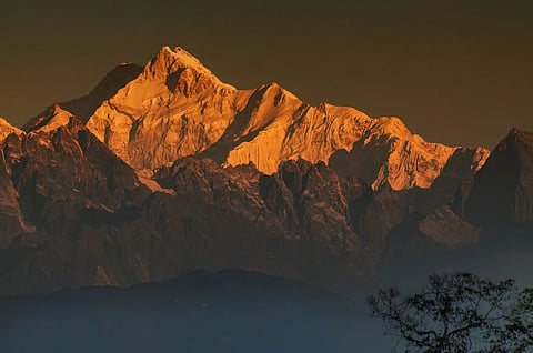 Get a close-up view of Mount Kanchendzonga from a helicopter