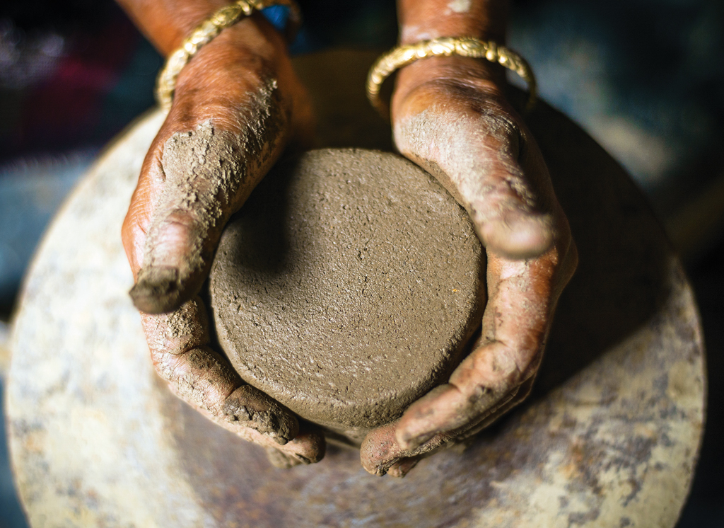 A Charai Taba potter works without any kind of motor, and uses her wheel more for precision sculpting, rather than giving the pot form