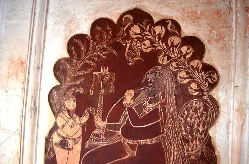 A painting depicting a scene of a royal smoking a hookah