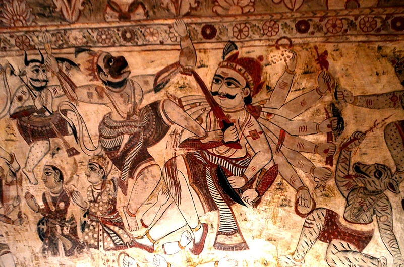 The murals are created by scratching off brown paint on the walls to reveal the drawings underneath