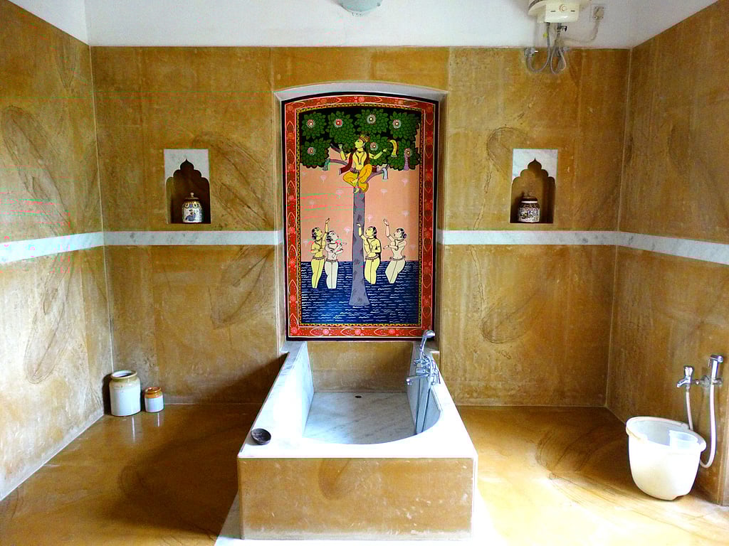 The traditional bathrooms in the palace have patachitra motifs