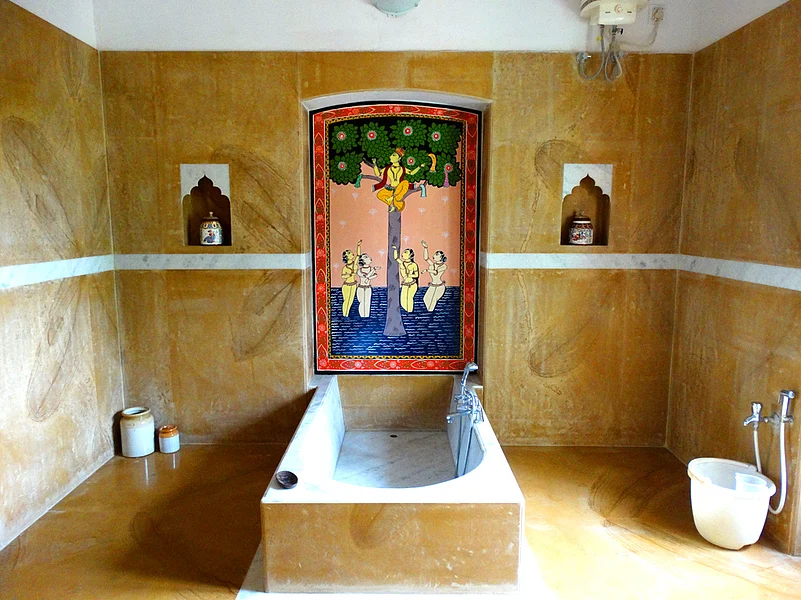 The traditional bathrooms in the palace have patachitra motifs