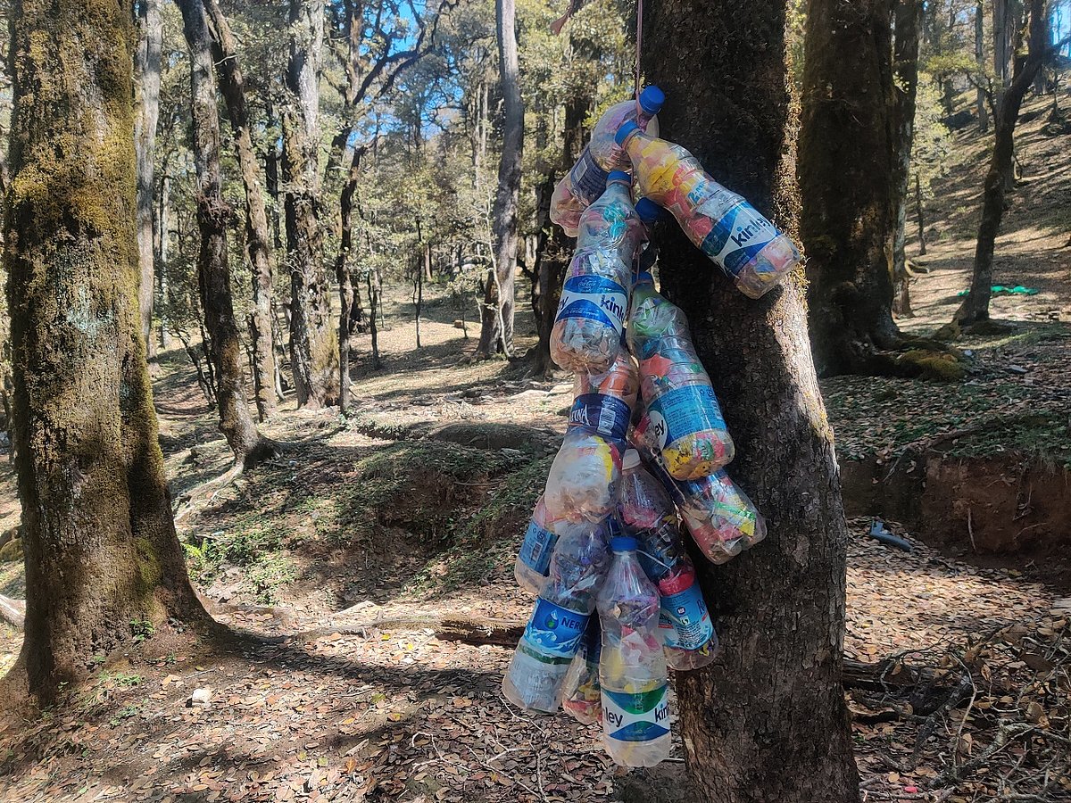 An ecobrick is a plastic bottle packed with used plastic to a set density