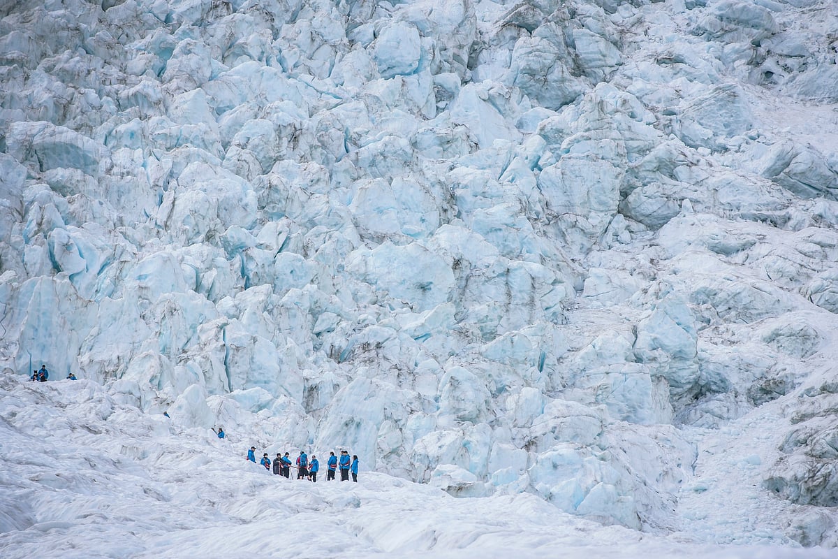 An experienced guide will equip you with all the necessary gear for your ice-climbing expedition