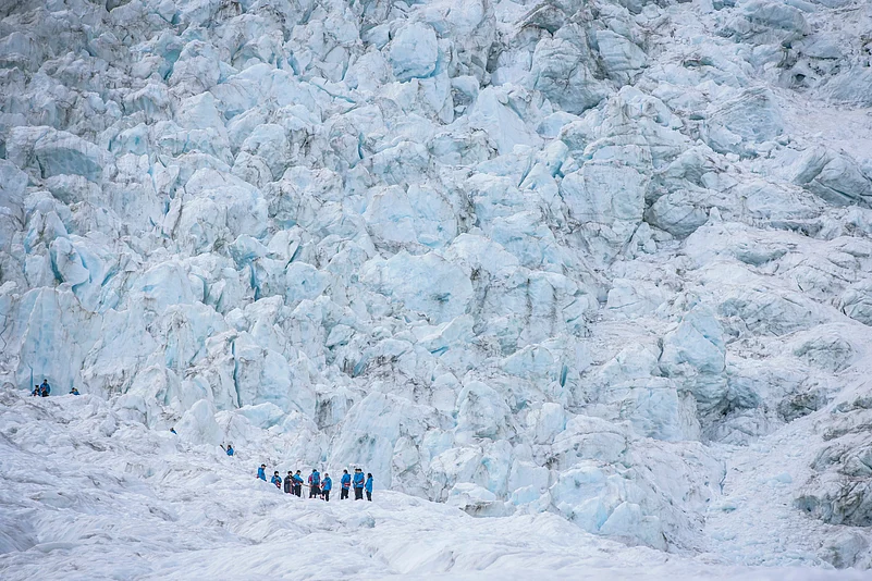 An experienced guide will equip you with all the necessary gear for your ice-climbing expedition