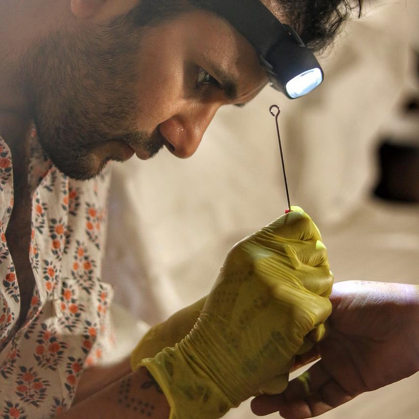 Shomil Shah during a tattoo making