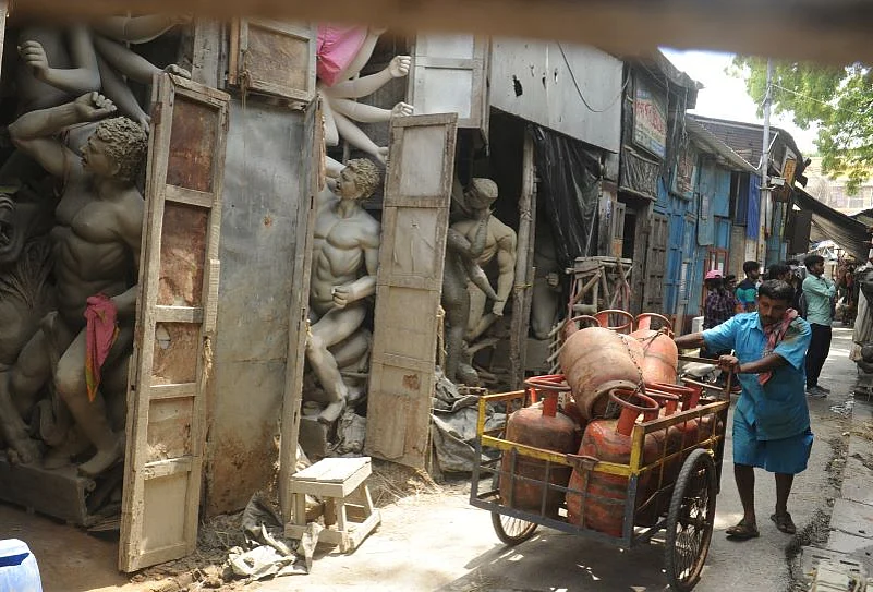 The narrow lanes of Kumortuli are dotted with studios