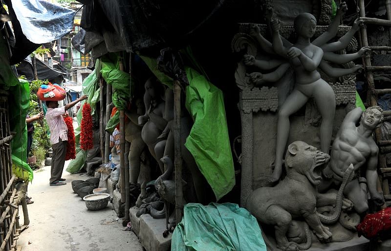 A walk around Kumortuli is like viewing an open-air art gallery with installations in clay