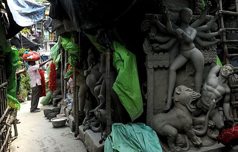 A walk around Kumortuli is like viewing an open-air art gallery with installations in clay