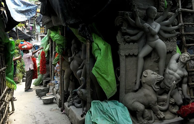 A walk around Kumortuli is like viewing an open-air art gallery with installations in clay