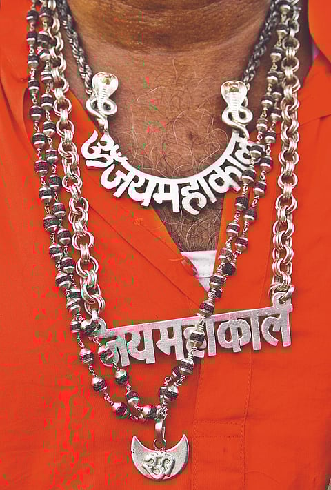 A devotee with a "Jai Mahakal" locket