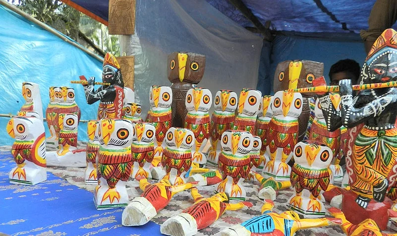 Many old Hindu families in Bengal who still worship a pair of painted wooden owls to seek the blessings of Lakshmi